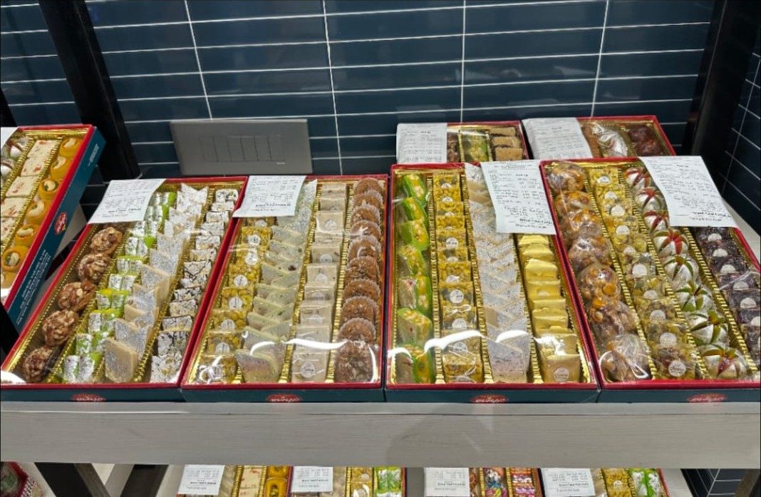 Fresh mithai and sweet boxes on display